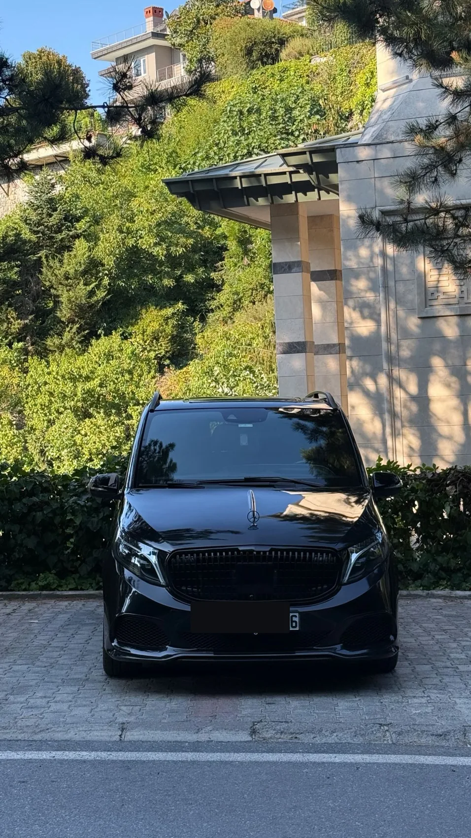 Black Mercedes-Benz V-Class luxury passenger van without visible license plate